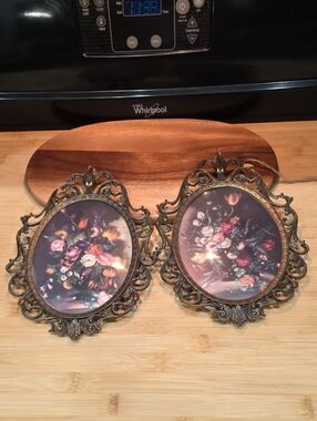 Pair of Brass Oval Framed Floral Prints in Convex Glass made in Italy.
